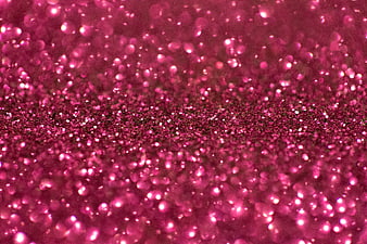 Macro Pink Glitter Texture with Sparkling Bokeh Background