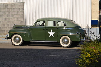 Vintage Green Military Car with White Star