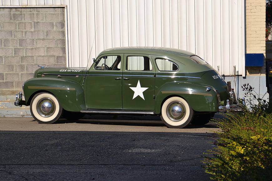 Vintage Green Military Car with White Star