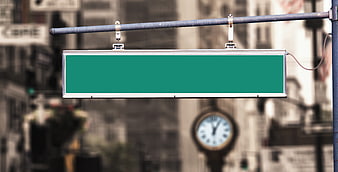 Blank Green Street Sign Mockup With Blurred Urban Background