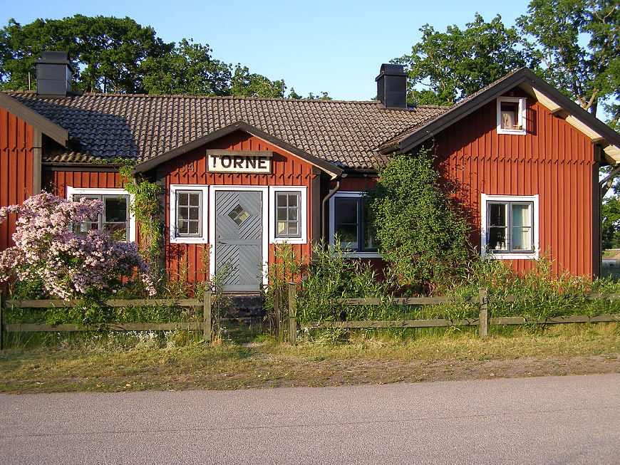 Red wooden Torne train station building in Sweden