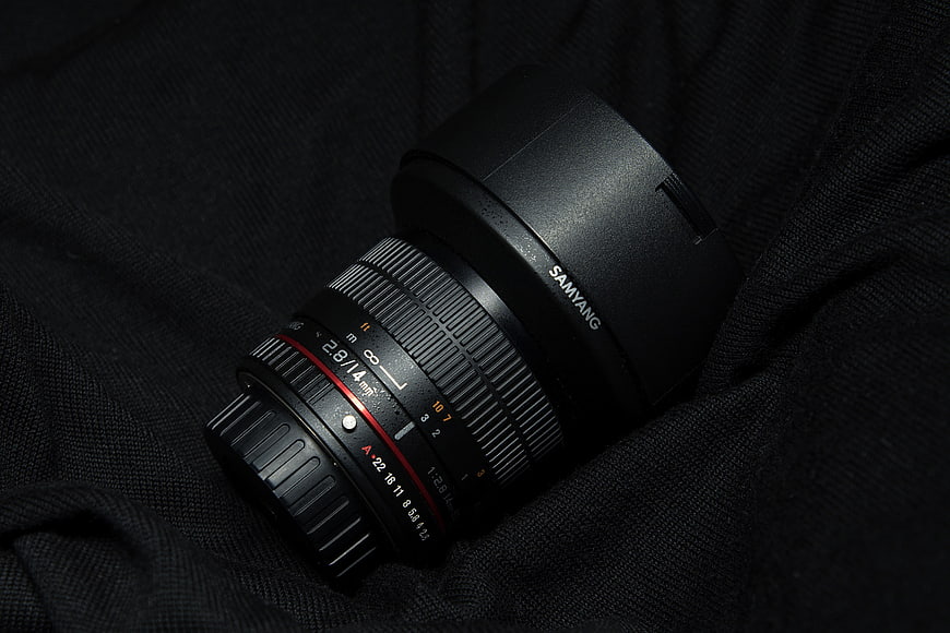 Samyang 14mm f/2.8 Manual Focus Lens on Black Fabric