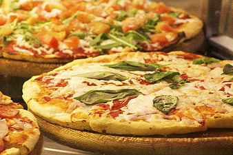 Fresh Italian Pizzas With Basil And Mozzarella On Wooden Boards