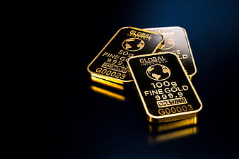 Stack of gold bars on dark background
