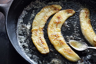 Caramelized Bananas Cooking in Cast Iron Skillet