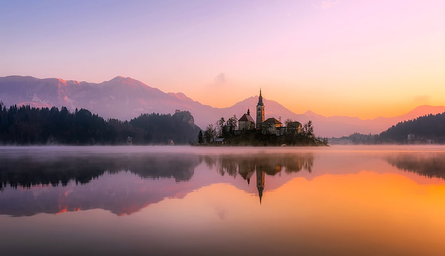Sunrise over Bled Island Church with Mountain Reflection