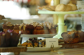 Assorted pastries and cakes on display in a bakery shop