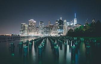 New York City Skyline at Night with Water Reflections
