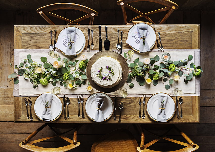 Rustic Wedding Table Setting with Cake and Floral Centerpiece