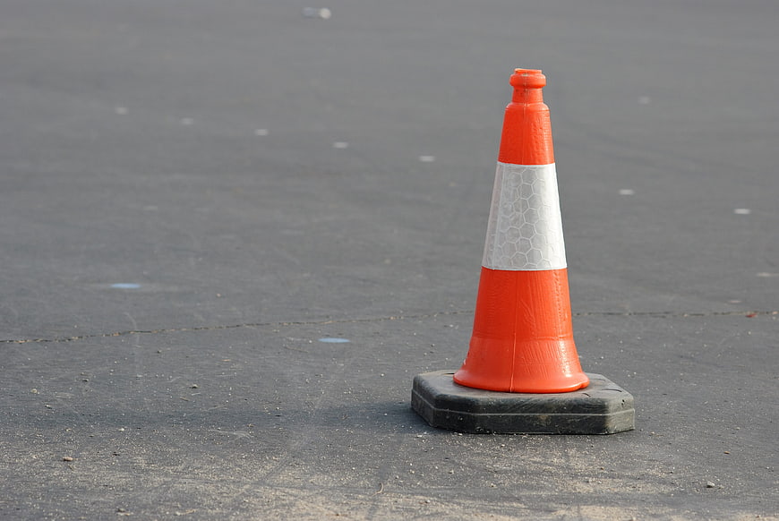 Orange Traffic Cone on Gray Asphalt Road Surface