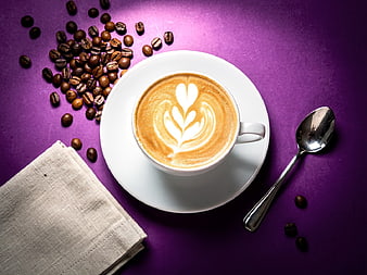 Top View Latte Art Coffee on Purple Background