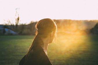 Woman Silhouette in Golden Hour Sunlight