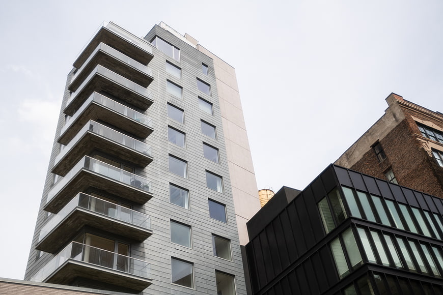 Modern High-Rise Apartment Building with Balconies