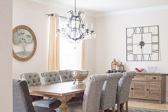 Elegant Dining Room with Chandelier and Wooden Table
