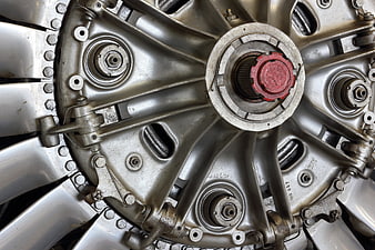 Close-up of vintage aircraft turboshaft engine with red cap