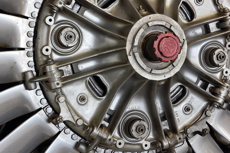 Close-up of vintage aircraft turboshaft engine with red cap