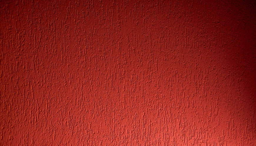 Deep Red Textured Wall Surface Background
