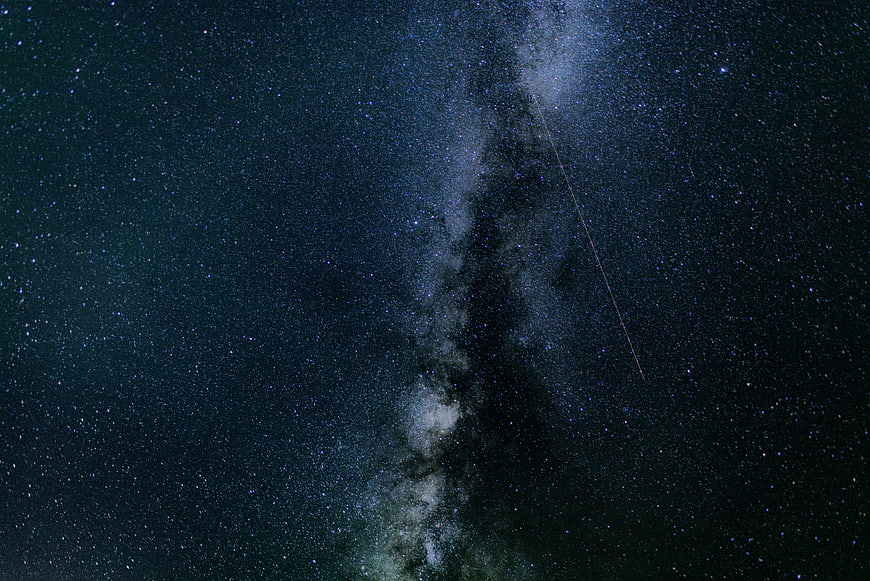 Milky Way Galaxy with Meteor Trail in Night Sky