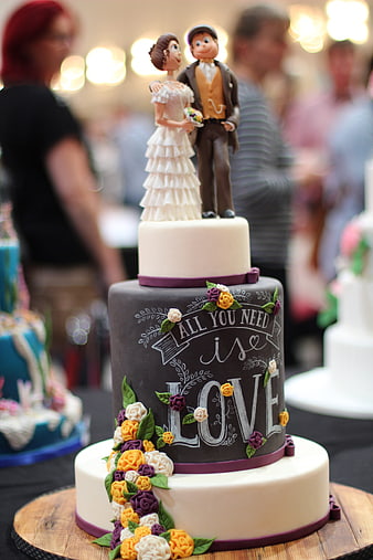 Chalkboard Wedding Cake with Floral Design and Couple Topper