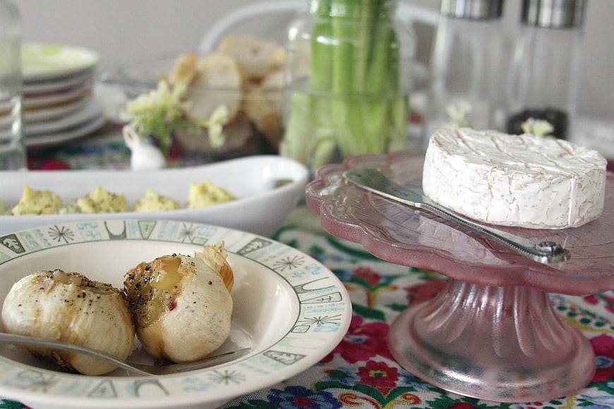 Rustic Brie Cheese and Roasted Garlic on Floral Tablecloth