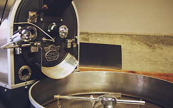 Close-up of Joper coffee roasting machine in industrial setting