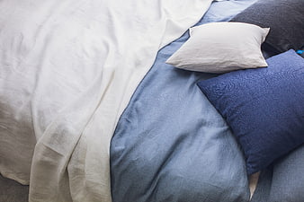 Blue and White Linen Bedding with Textured Pillows
