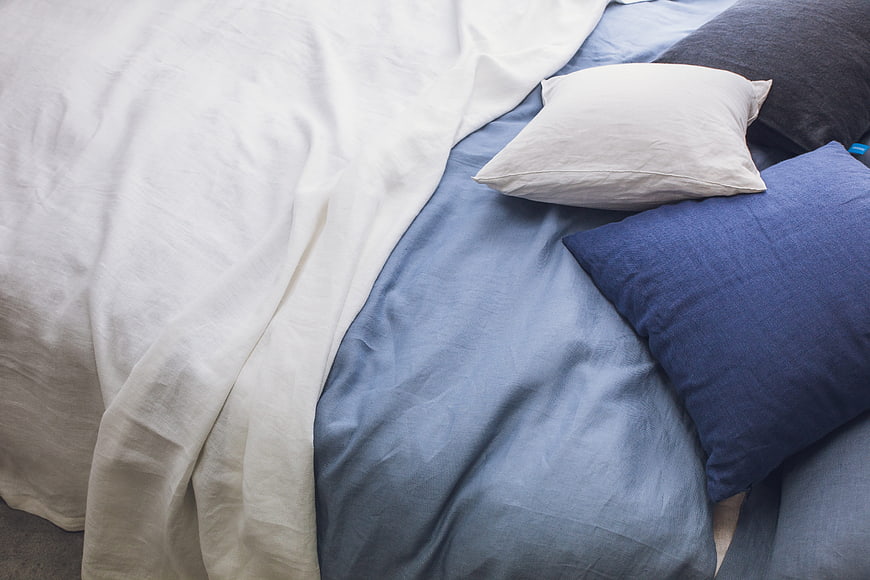 Blue and White Linen Bedding with Textured Pillows