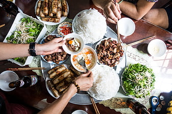 Top View of Vietnamese Feast with Spring Rolls and Noodles