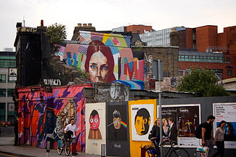 Vibrant Street Art Mural on Urban Construction Hoarding