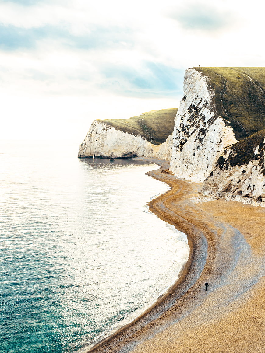 Aerial View of White Cliffs and Sandy Beach Coastline