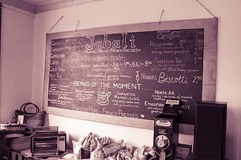 Vintage chalkboard menu in a rustic coffee shop