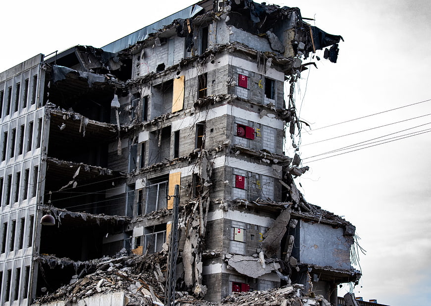Severely Damaged Multi-Story Concrete Building Ruins