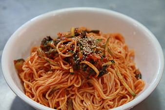 Spicy Korean Bibim Noodles in White Bowl