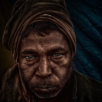 Intense Close-Up Portrait of Man with Turban