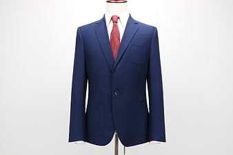 Navy Blue Men's Suit Jacket With Red Tie On Mannequin