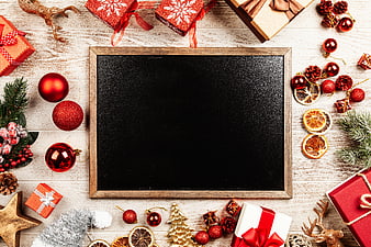 Christmas flat lay with chalkboard and holiday decorations