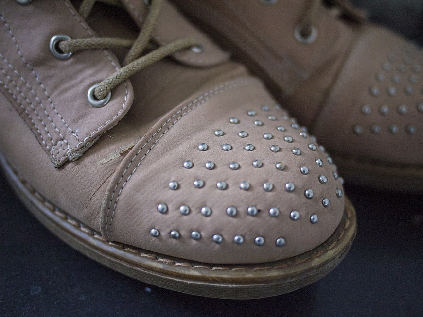 Close-up of Tan Leather Studded Boots with Silver Studs