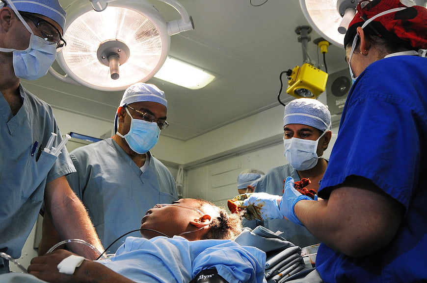 Medical Team Performing Surgery in Operating Room