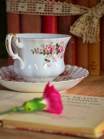 Vintage Floral Teacup on Antique Books