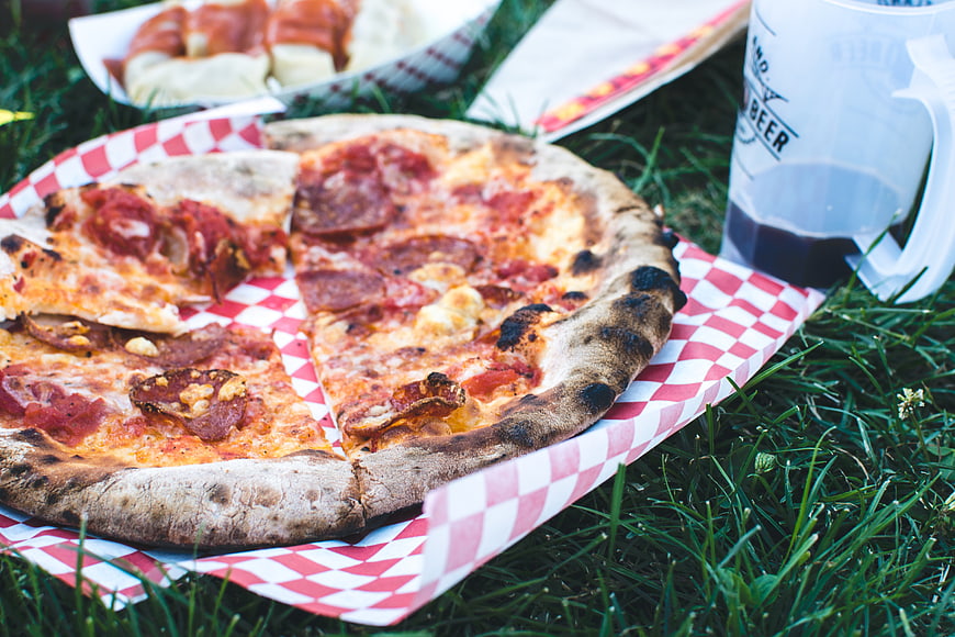 Pepperoni Pizza on Grass with Beer Mug