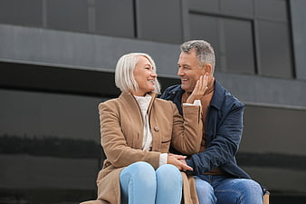 Happy Senior Couple Laughing Together Outdoors
