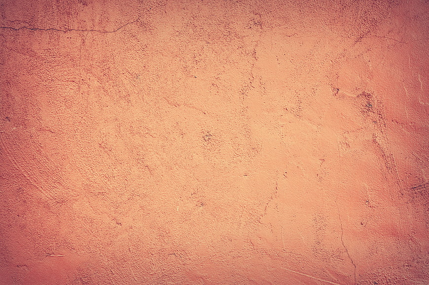 Textured Orange Stucco Wall Background