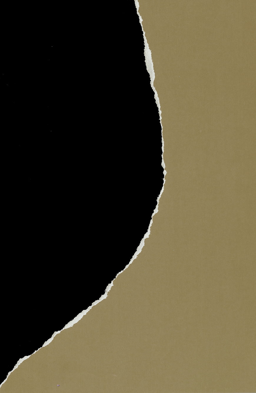 Torn Paper Edge on Black Background
