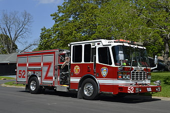Red and White Fire Engine 52 Parked on Suburban Street