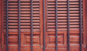 Vintage Wooden Door with Twisted Iron Bars