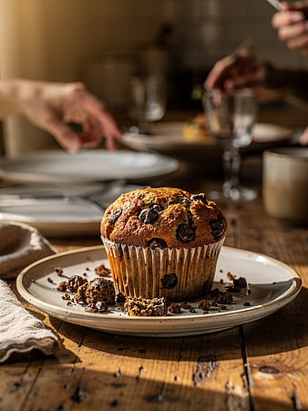 Chocolate Chip Muffin on Rustic Wooden Table