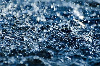 Macro Photography of Splashing Water Drops and Ripples