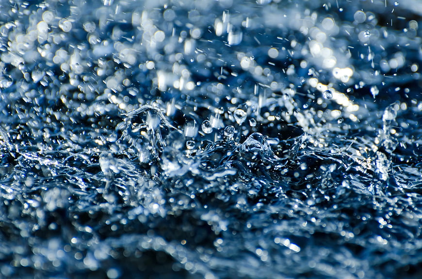 Macro Photography of Splashing Water Drops and Ripples