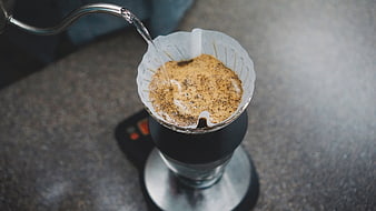 Pour-over coffee brewing process with gooseneck kettle