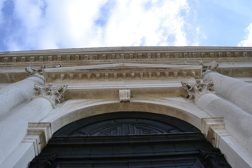 Low angle view of classical stone archway and columns